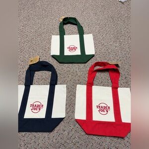3 NWT Trader Joe's Canvas Tote Bags - Red, Green, and Blue